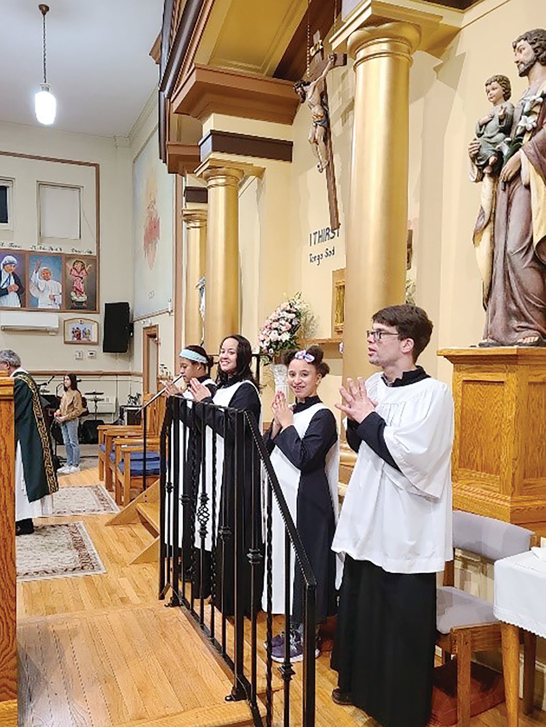 The Special Religious Education (SPRED) Office of the Diocese of Providence helps parishes in Rhode Island better serve those parishioners with intellectual and developmental disabilities. SPRED responds to the needs of individuals on the Autism spectrum, Down syndrome, cerebral palsy, seizure disorders, as well as people with other diagnoses. Pictured, above, SPRED altar servers at St. Patrick Church, Providence.